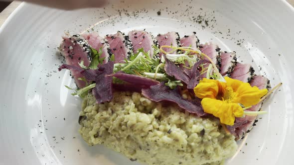 Delicious Tuna Tataki with Edible Flower and Rice