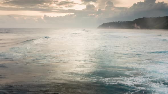 Aerial View of Huge Waves Breaking As They Roll to Sea Shore alt