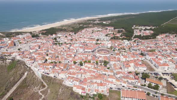 Sitio, hilltop old neighbourhood of Nazaré, Silver Coast, Portugal. Seascape and town. Aerial view alt