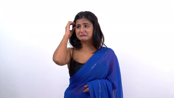 Indian woman smelled something disgusted in saree alt