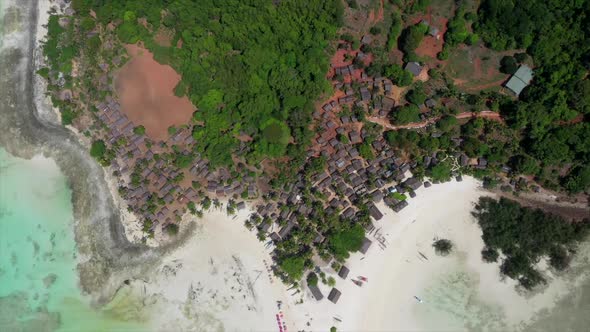 fly over shot of a small tropical island in the Indian Ocean off Madagascar alt