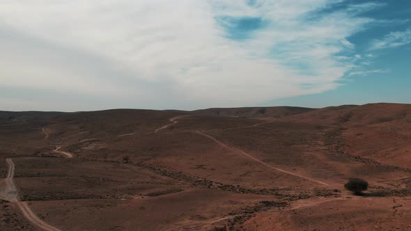 Revealing drone shot of the beautiful desert of Southern Israel. alt