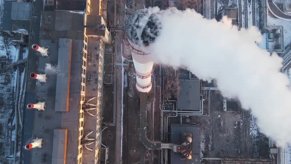 Industrial Emission carbon gases from factory pipes with smoke in atmosphere alt