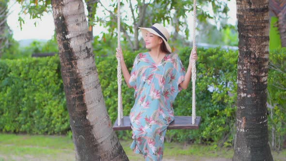 Asian woman enjoy around beautiful beach sea ocean alt