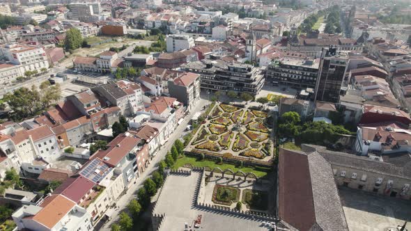 Aerial view of Braga city center. Very preeminent a colorful garden with flowers alt