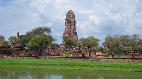 Time-lapse panning of Ruins of pagoda of Wat Phra Ram temple in Ayutthaya historical park, Thailand alt