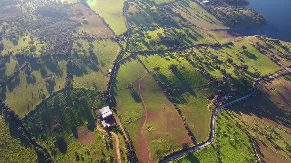 Aerial View of Portuguese Spanish Natural Landscape of Mountains and Fields with Water Tank