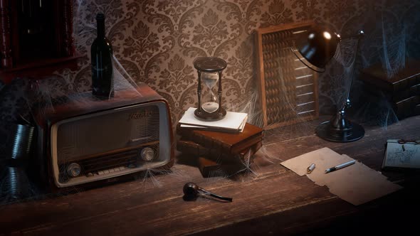 Antique hourglass on he vintage wooden desk in the old room. Abandoned office. alt