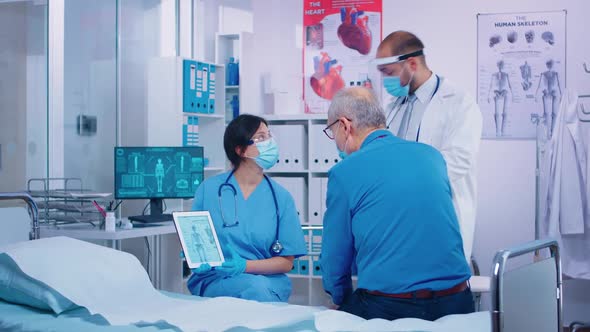 Patient with Osteoporosis Getting Medical Consultation alt