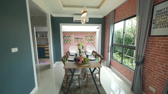 Colorful and Retro Open-Plan Home Decoration With Brick Wall alt