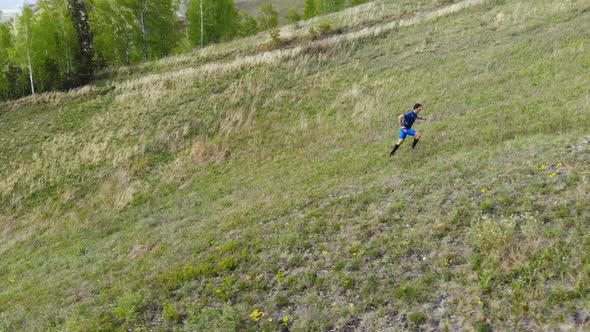 A Man Runs Up the Mountainside.