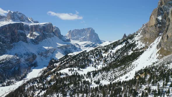 Aerial, Breathtaking View On Snowy Dolomites Mountains, Huge Peaks And Beautiful Winter Landscape