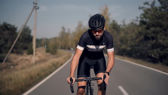 Bike Cycling.Cyclist Fitness Riding On Road Bike.Cyclist Triathlete Training Workout On Bicycle. alt