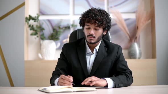 Friendly Positive Successful Indian Business Person Mentor or Student Talking with Colleague or alt