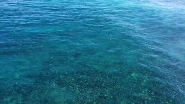 Indonesia. Waves and azure water as a background. View from drone at the ocean surface.  alt