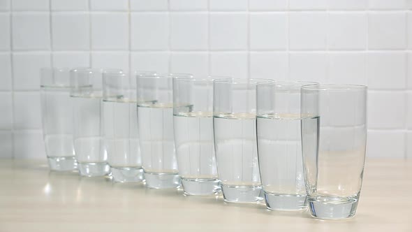 Pouring glass of water alt