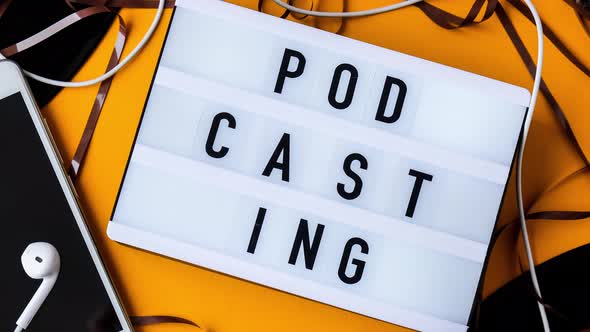 Podcasting Lettering and Vinyl Record Album Audio Cassette Tape Headphones and Mobile Phone alt