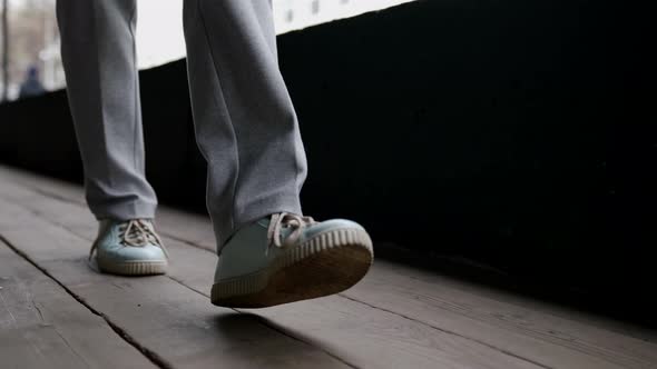 Woman is Walking Over Old Wooden Floor Closeup of Feet Casual Style for Walk in City alt
