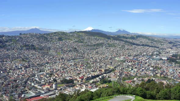 Aerial view of Quito, the capital of Ecuador with the Cotopaxi vulcano alt