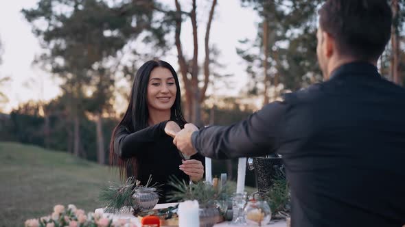Romantic Dinner in Nature is in Full Swing Young People Engaged in Nature Sit at the Table the Happy alt