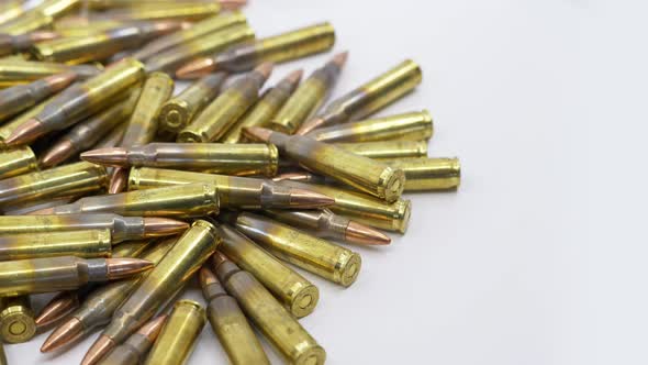 Close Up of Rifle 5.56 Reloaded Ammunition Left Justified Rotating