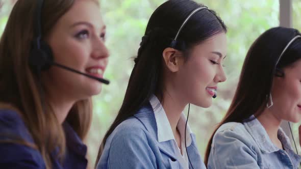Customer Support Agent or Call Center with Headset Talking to Customer on Phone alt