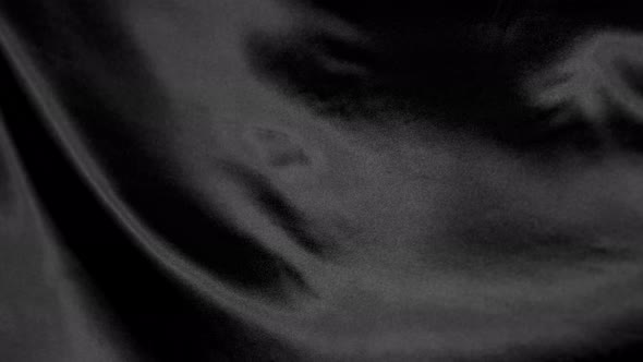 Black Wavy Fabric Background in Super Slow Motion alt