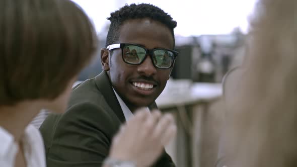 Young Businessman Smiling alt