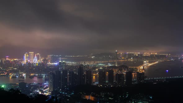 Macau Peninsula Night Districts By Bridge in China Timelapse alt