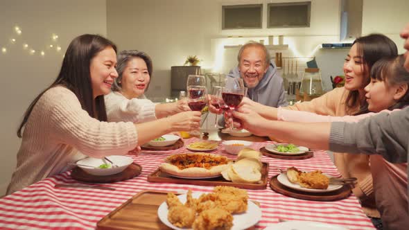 Happy family time and relationship, Asian big family having christmas party eating food together. alt