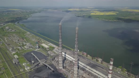 Thermal Power Plant on the Background of an Artificial Reservoir. Video From the Drone. Electricity