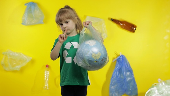 Girl Activist Makes Earth Globe Free From Plastic Package. Reduce Trash Pollution. Save Ecology alt