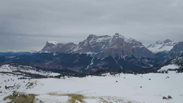 Aerial, Beautiful View On Snowy Dolomites Mountains, On A Cloudy Day In Italy