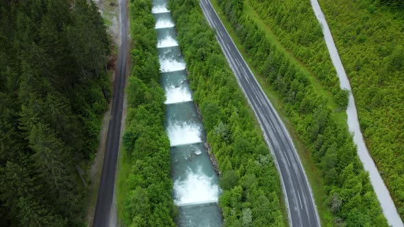Aerial View of Mountain Road Along Cascade River Reveal Beautiful Alpine Valley alt
