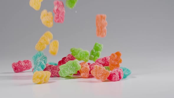 Gummy bear candies falls in slow motion alt