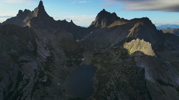 Aerial View of a Mountain Range with Sharp Peaks in the Siberian Park Ergaki alt