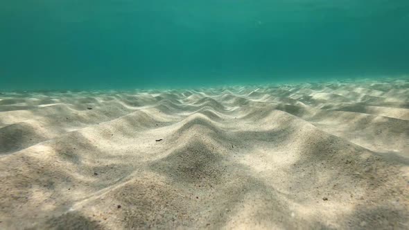 Underwater view of turquoise water and seabed, Ionian Sea, Italy alt