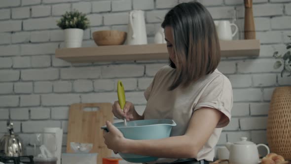 Woman in the Kitchen Cooking