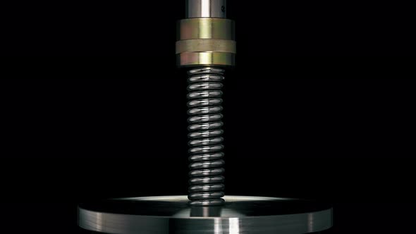 Test of Reliability of a Spring, Compression and Decompression By a Hydraulic Press alt