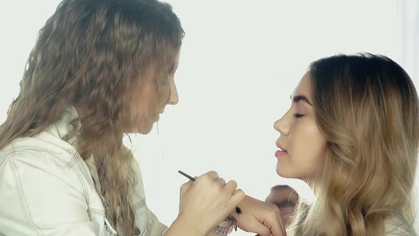 Close View Pretty Girl Artist Does Professional Makeup alt