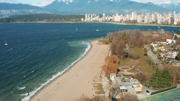 Scenic aerial drone view over Kitsilano Beach in Vancouver, British Columbia. alt