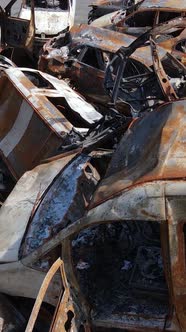 Vertical Video of Destroyed Cars in the City of Irpin Ukraine alt