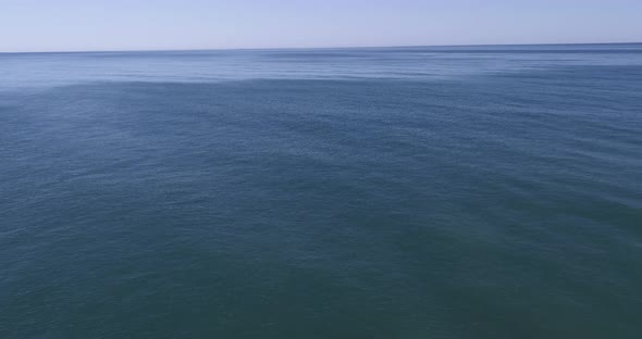 4k drone video flight over ocean, sea. Close to the water alt