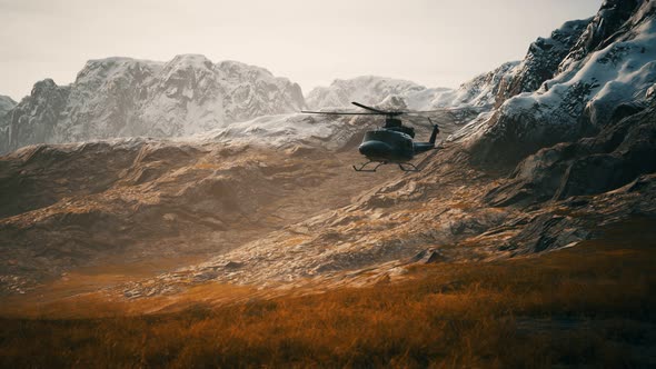 Slow Motion Vietnam War Era Helicopter in Mountains alt