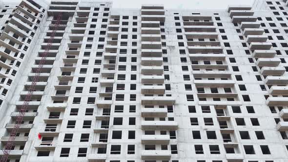 Construction of the High Floor House Construction Cranes the Bottom View Up Slow Movement of a Video alt