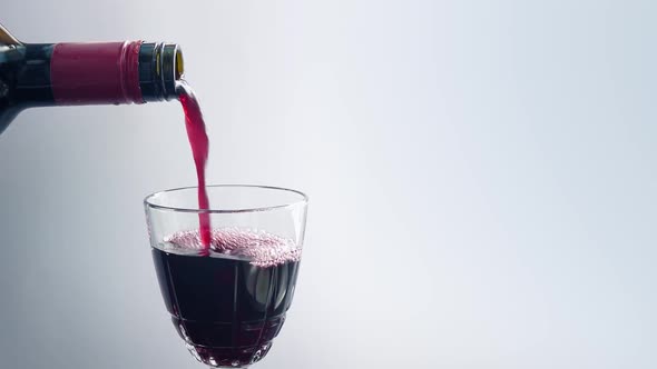 Wine Pouring Into Glass alt