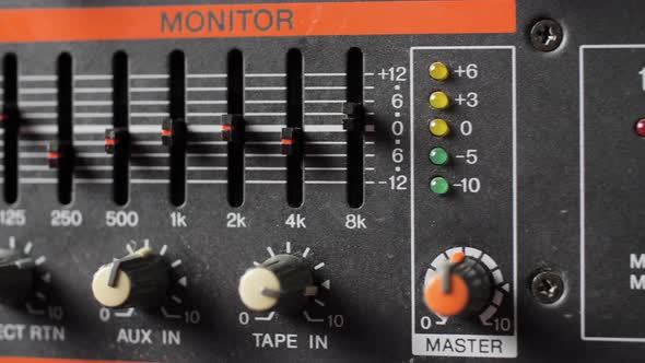 Old dusty audio console closeup. Sliding. alt