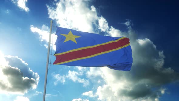 Democratic Republic of the Congo Flag Waving at Wind Against Beautiful Blue Sky alt