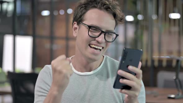 Portrait Shoot of Successful Guy Celebrating with Fest alt