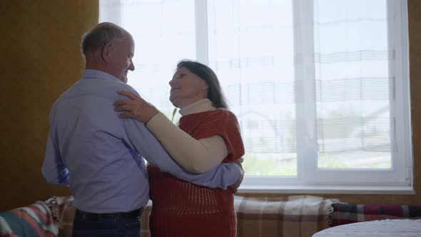 Elderly Couples Romantic Middle-aged Grandparents Relax Together Having Fun Dancing at Home alt